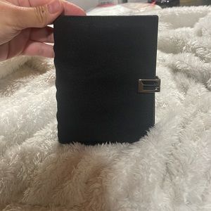 Gucci Black agenda/wallet w silver tone hardware.
